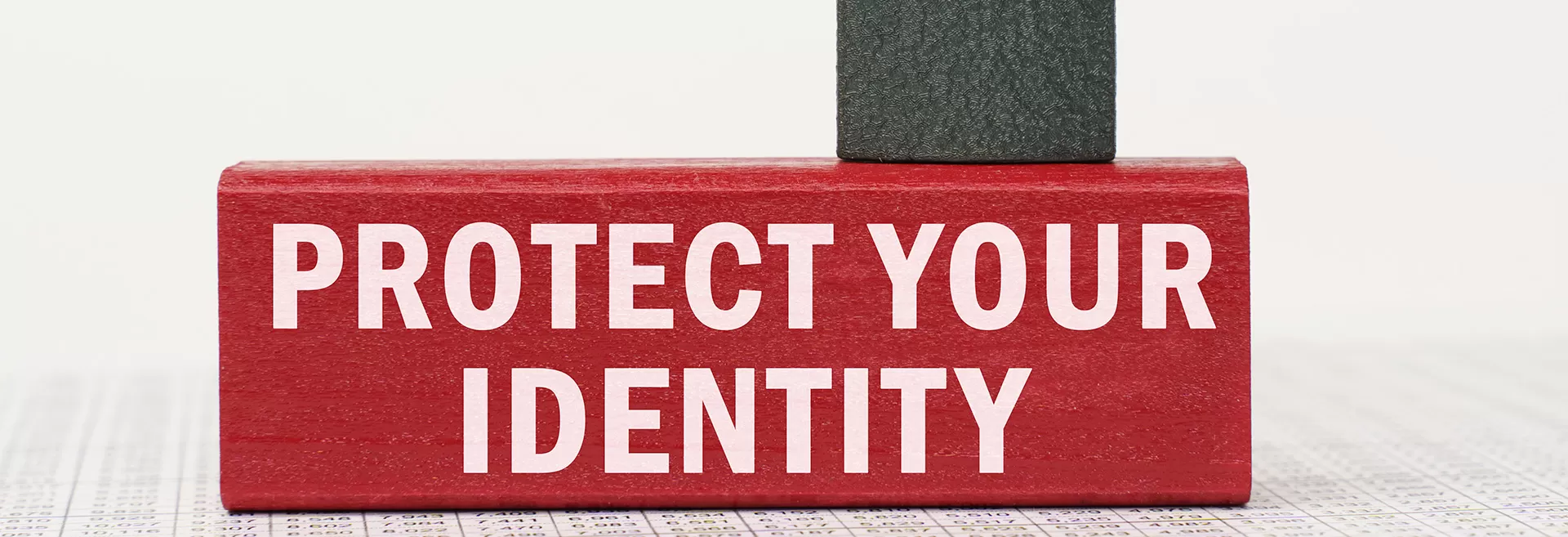 Protect your identity in red block with lock on top
